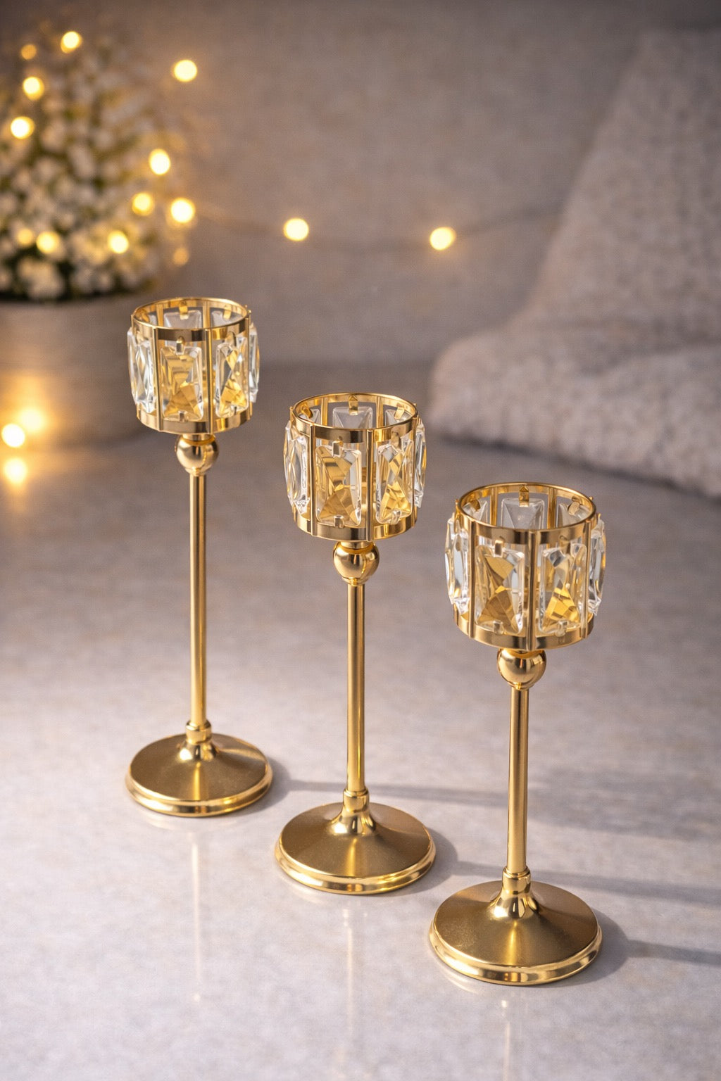 Set de 3 Portavelas Dorados con Cristal – Alturas Variadas